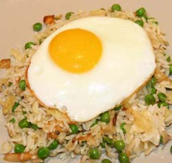 Green pulao with cardamom and almonds
